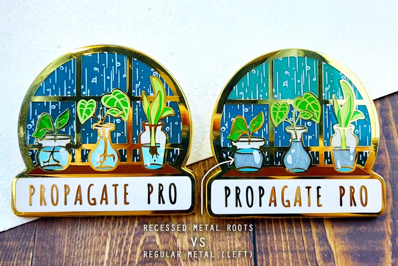 Two of the same plant enamel pins are side by side, showing the comparison between the standard version on the left and the second b grade version on the right. The B grade pin is marked on sale due to some of the metal lines being less visible.
