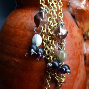 Eco-Friendly, Chic Seed and Garnet Dangle Earrings with a Touch of South American Tradition