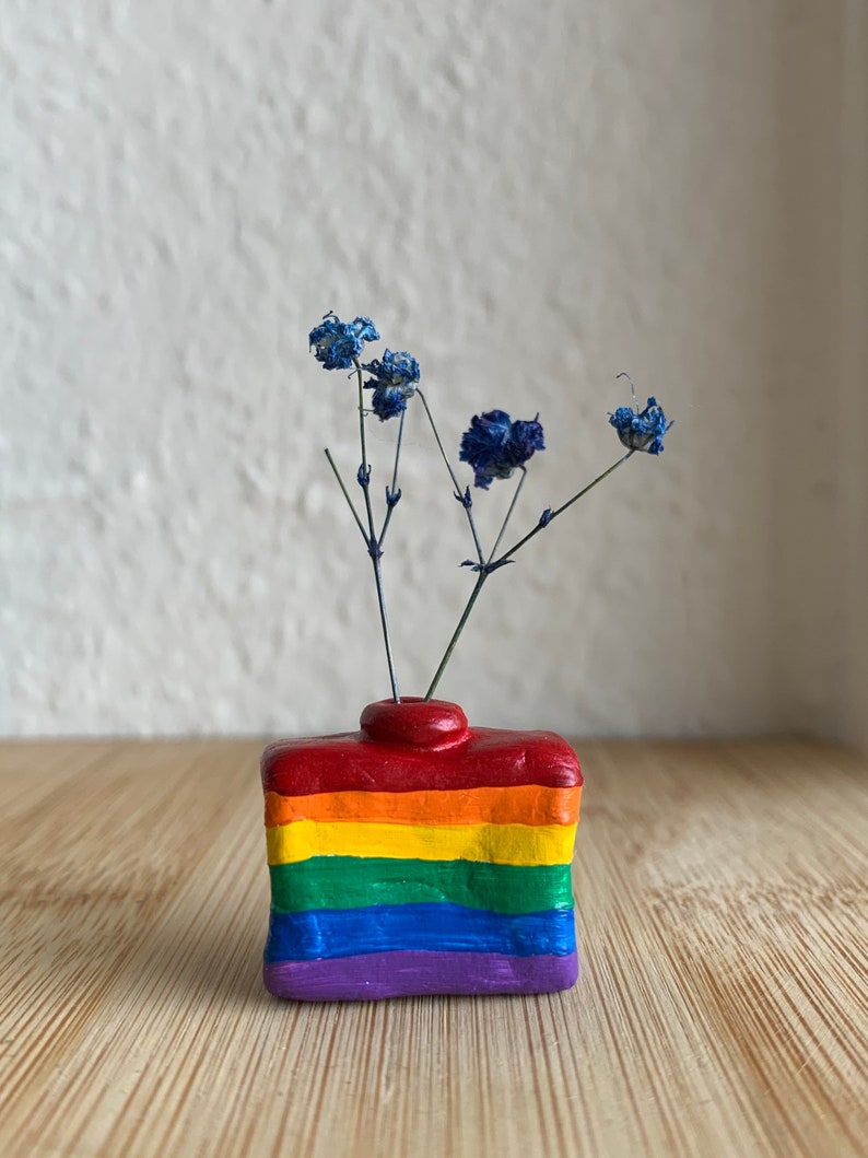 Tiny clay vase for small flowers Proud