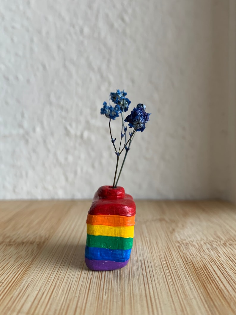 Tiny clay vase for small flowers Proud