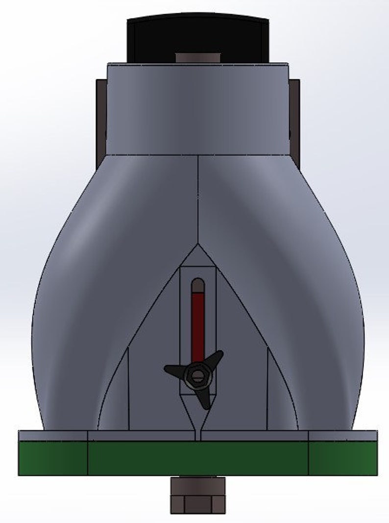 May include: A gray and black ceramic pottery wheel with a red and black indicator. The wheel has a three-pronged black knob and is mounted on a green base.