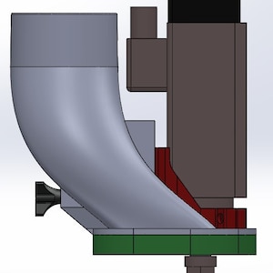 May include: A 3D model of a gray and black industrial machine with a green base and a red component. The machine has a curved, funnel-shaped part and a small black knob.