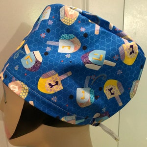 Women's Scrub hat, head covering, chemo cap~ Hanukkah- Dreidels with Blue Background.