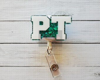 Porta-crachá retrátil com glitter para fisioterapeuta: presente artesanal em acrílico para fisioterapeutas.