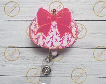 Breast Cancer Awareness Pumpkin Badge Reel: Pink Ribbon Glitter