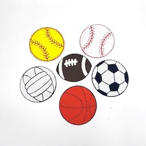May include: Six embroidered patches of different sports balls: a yellow softball, a white baseball, a brown football, a white soccer ball, and a red basketball.