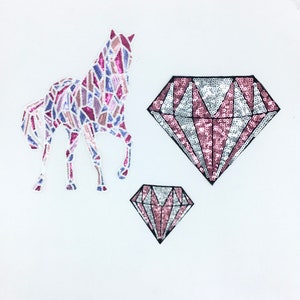 May include: Three iron-on patches featuring a pink and purple horse, a large pink and silver diamond, and a smaller pink and silver diamond.