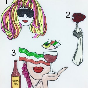 May include: Three colorful iron-on patches. The first patch is a woman with pink, yellow, and green hair wearing sunglasses. The second patch is a black hand with a red rose on the index finger. The third patch is a woman's face with a glass of wine and a bottle of wine that says "Grape Wine".
