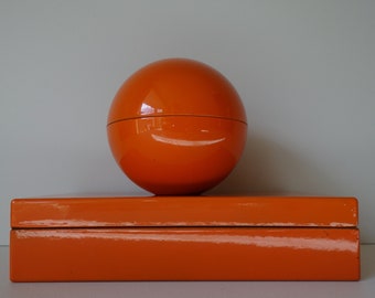 Vintage 1970s orange lacquered rectangular pencil box and round pin cushion box marked Foreign Japan Hong Kong rare color plastics pop art