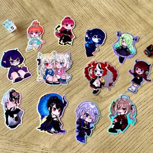 Hololive EN 8cm Holographic sticker (Calli, Bae, iRys, Mumei, Kronii, Fauna, Nerissa, Shiori, Bijou, FWMC)