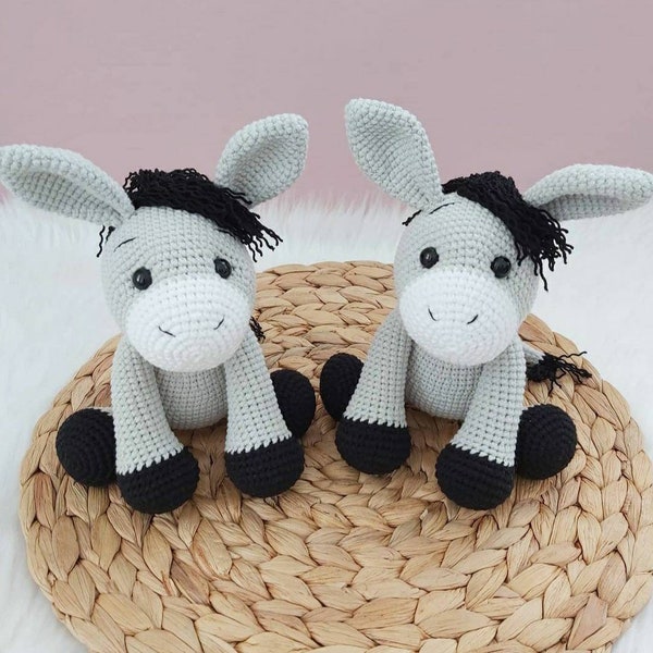 Amigurumi crocheted donkey soft toy