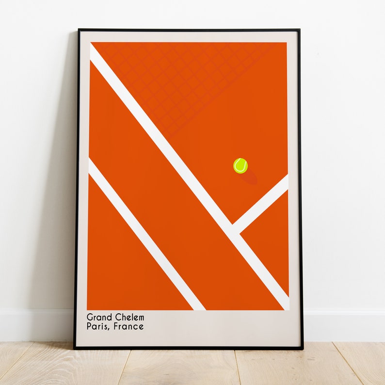 May include: A minimalist illustration of a tennis court with a single yellow tennis ball in the center. The court is red with white lines. The text "Grand Chelem Paris, France" is at the bottom of the image.