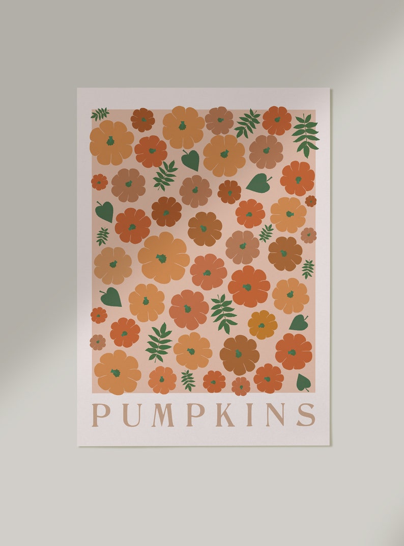 May include: A digital print featuring a pattern of orange, brown, and green pumpkins and leaves on a light pink background. The text "PUMPKINS" is at the bottom of the print.