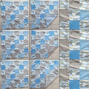 May include: A patchwork baby blanket featuring squares of blue, gray, and patterned fabrics. The blanket includes elephant and striped patterns, with a soft, textured backing. The design is a mix of solid and patterned squares.