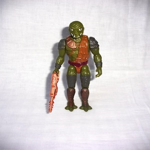 Rare Lizzor 1989 Les nouvelles aventures de He Man, les maîtres de l'univers Figurine originale des années 80 Mattel 1989 Malasia MOTU lézard Monster