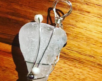 Pearl and wire wrapped sea glass pendant necklace.