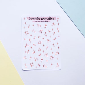 May include: A sheet of pink star stickers with the text "Lavender Love Store" and "Pink Stars Sticker Sheet".