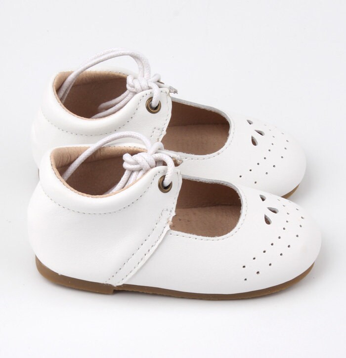 white hard bottom baby shoes