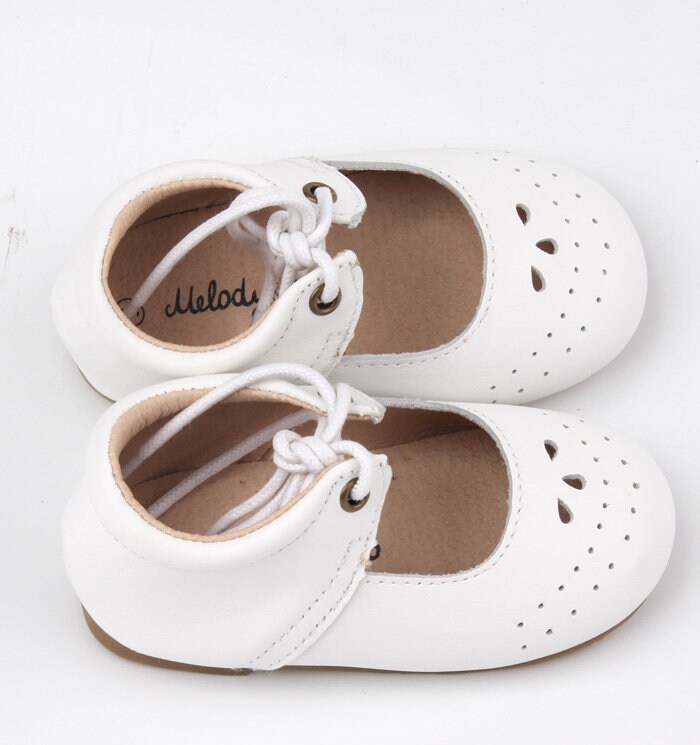 white hard bottom baby shoes