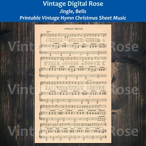 May include: Vintage sheet music for the Christmas carol "Jingle Bells". The sheet music is printed on a cream-colored paper with black ink. The title "Jingle Bells" is printed at the top of the page. The lyrics and musical notes are printed below the title.