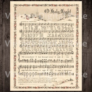 May include: A vintage sheet music print of the Christmas carol "O Holy Night". The sheet music is printed on cream-coloured paper with a brown border. The music is written in black ink with red and blue accents. The title of the carol is printed in large, bold letters at the top of the page. The lyrics are printed below the music. The sheet music is decorated with a winter scene of a snowy village.