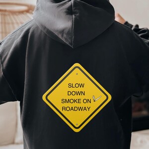 Slow Down Smoke on Roadway, Funny Unisex Marijuana Leaf Graphic Sweatshirts, Crewneck Marijuana Leaf Graphic Long Sleeve Shirt