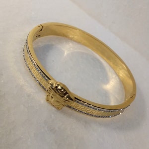 Titanium vergulde armband, met Grieks ontwerp