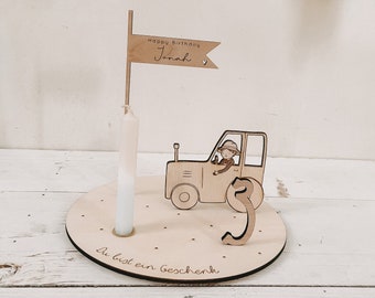 Candle plate tractor including pennant, number and candle