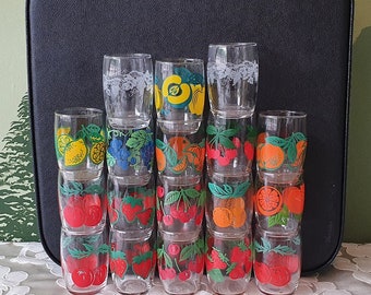 Vintage lemonade glasses, 70s fruit lemonade (grape, lemon, cherry, pomegranate, orange, lime, apple).  Cerve, Italy. Retro design.