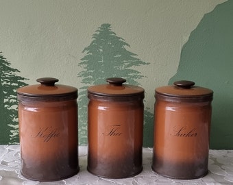 vintage Brabantia brown storage cannister set 80's coffee tea sugar container blik cylindrical orange Dutch design