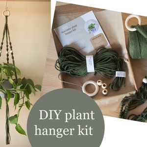 May include: DIY macrame plant hanger kit with green cord, wooden beads, and instructions. The kit includes everything you need to make a hanging planter for your home.