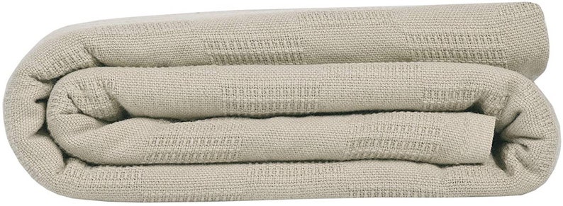 May include: A folded beige throw blanket with a textured weave.