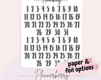 May include: White sticker sheet with black numbers 1-31 for calendar or planner use. The sticker sheet has the Plannerberry logo and the text "paper & foil options".