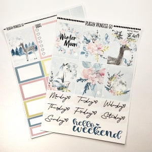 May include: A set of planner stickers featuring a winter theme with a deer, fox, and floral designs. The stickers include the words "Winter Moon", "Monday", "Tuesday", "Wednesday", "Thursday", "Friday", "Saturday", "Sunday", and "hello weekend".