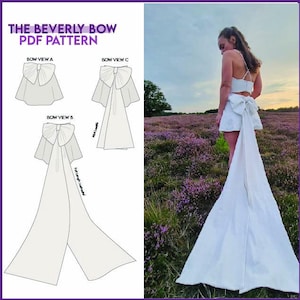 May include: The Beverly Bow PDF Pattern. A white outfit with a large bow and a long train is shown. The pattern includes three bow view options. The model is standing in a field of purple flowers.