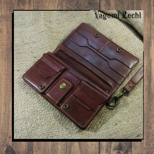 Cartera de mano de gran capacidad. Cartera de viaje. Hecha a mano. Personalizada. Artículos originales.