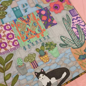 May include: A colorful illustration of a scene with a black and white cat, potted plants, and patterned rugs. The artwork features a variety of flowers, cacti, and a blue cobblestone path. The color palette includes shades of pink, blue, green, orange, and purple.