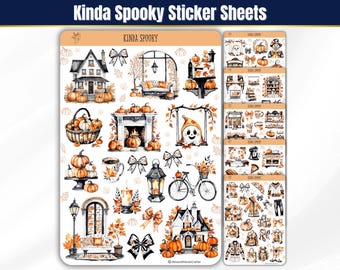 May include: A collection of Kinda Spooky sticker sheets featuring autumn-themed illustrations including pumpkins, a haunted house, a ghost, a bicycle, a fireplace, lanterns, bows, and fall foliage in shades of orange, black, and white on a light background.
