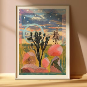 May include: Framed art print featuring a desert landscape with a Joshua tree, pink rocks, and a cowboy on horseback. The sky is a mix of blue, orange, and yellow with white stars. The artwork has a vintage, artistic style.