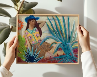 May include: A framed painting featuring a woman in a blue hat and yellow top with floral accents, set against a backdrop of blue agave plants and colorful foliage. The artwork has a rustic, textured appearance, with visible brushstrokes and a warm color palette.