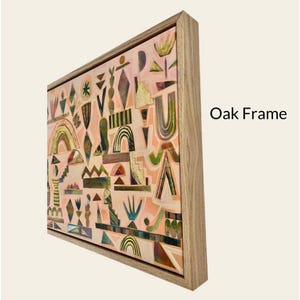a vibrant abstract art piece with a variety of geometric shapes and patterns in shades of pink, green, and yellow. The artwork is framed in a wooden frame, and the text "Oak Frame" is visible in the image.