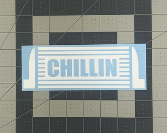 May include: White vinyl decal with the word "Chillin'" in blue letters on a light blue background.