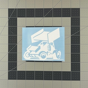 May include: White silhouette of a sprint car on a light blue background.