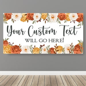 May include: A printable sign with a floral border in shades of orange, yellow, and white. The text on the sign reads "Your Custom Text Will Go Here!"