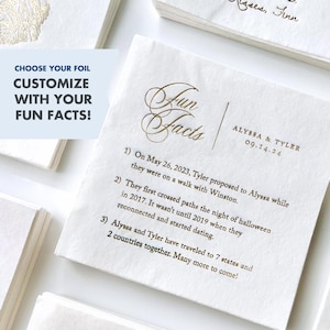 May include: A white card with gold foil lettering that says "Fun Facts" and lists three fun facts about a couple named Alyssa and Tyler. The card also includes their wedding date, 09.14.24.