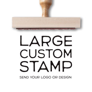 May include: A wooden stamp with the text "LARGE CUSTOM STAMP" and the instructions "SEND YOUR LOGO OR DESIGN".