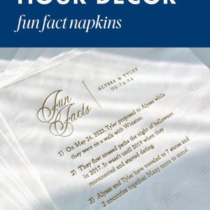 a set of four cocktail napkins sitting on top of a table