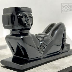 Sculpture of chac mool. 9.5" (24cm), hand carved in golden obsidian