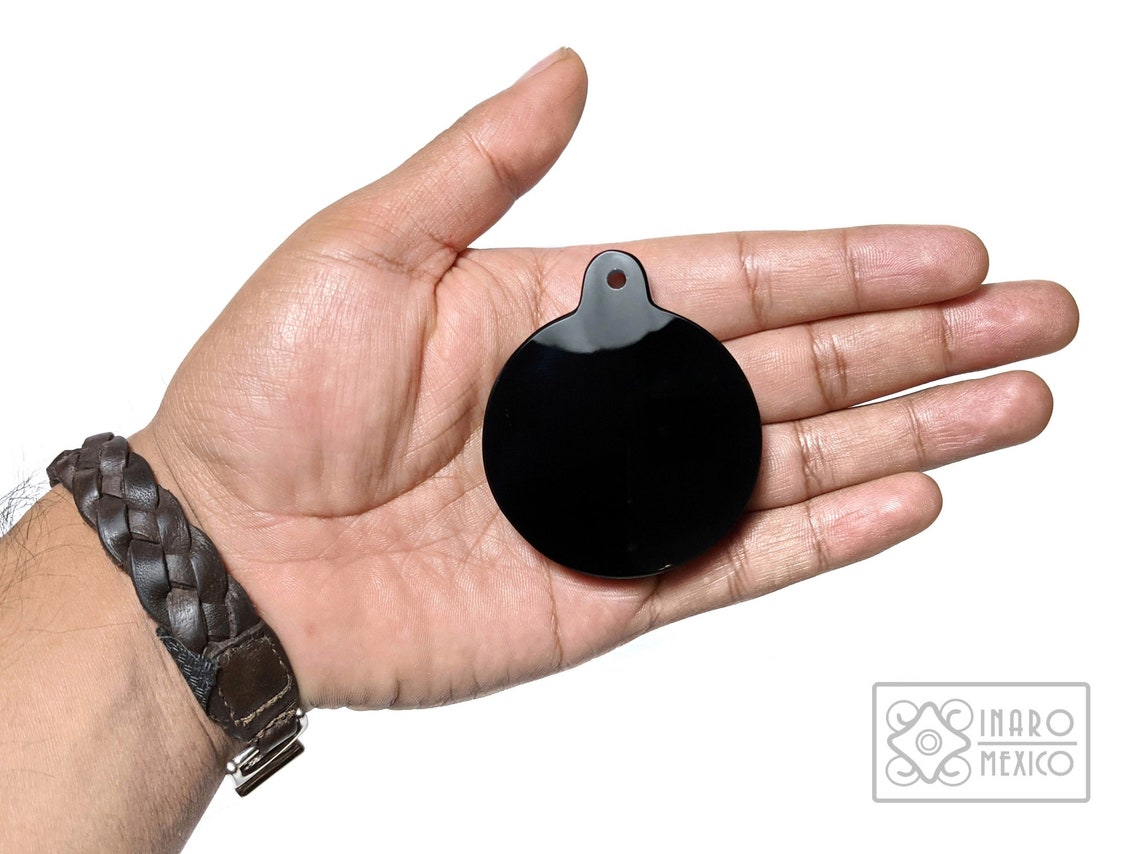 Obsidian mirror pendant scale replica of the original in the Etsy