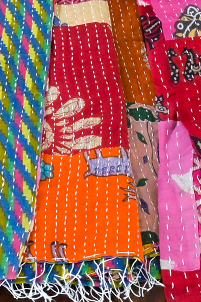 long patchwork scarf, colorful fun accessory, hippie boho style, features bright geometric patterns, casual every day scarf, made in india, made by artisans, soft cotton material, end strings, warm winter wrap, kantha fabric